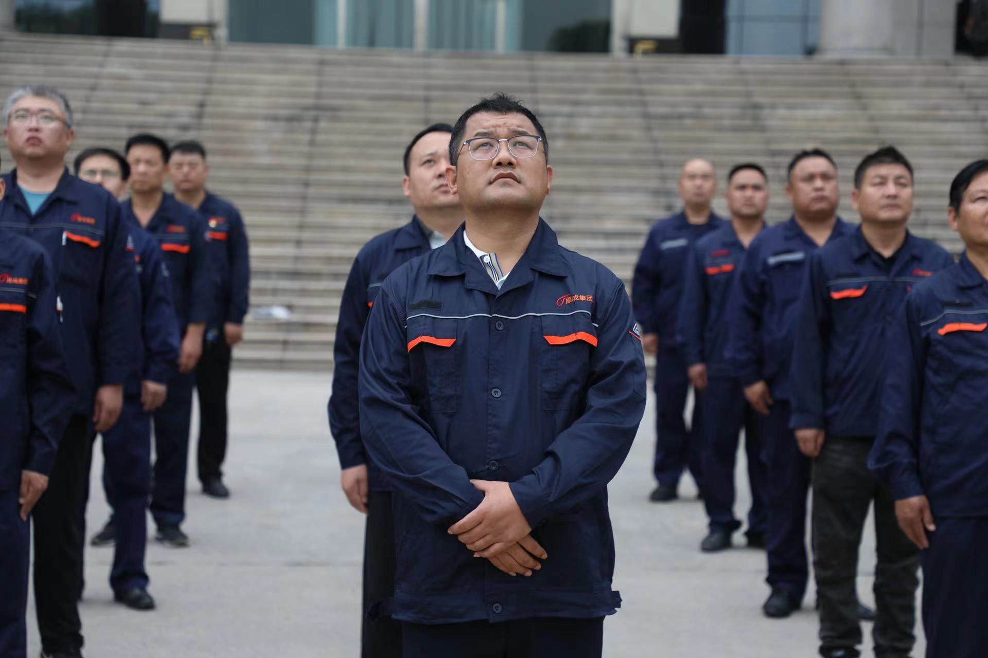 隆重进行留想建党103周年升旗典礼